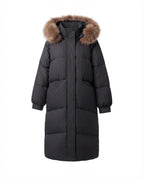 Women's longer quilted winter parka with feminine A-line, detachable hood, and extra large side pockets