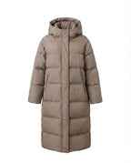 Women's longer padded quilted coat with two-way zipper, adjustable hem, and windproof outer shell