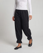 Women's wide linen-look trousers with elastic waistband and flounce cuffs Fashion Glam