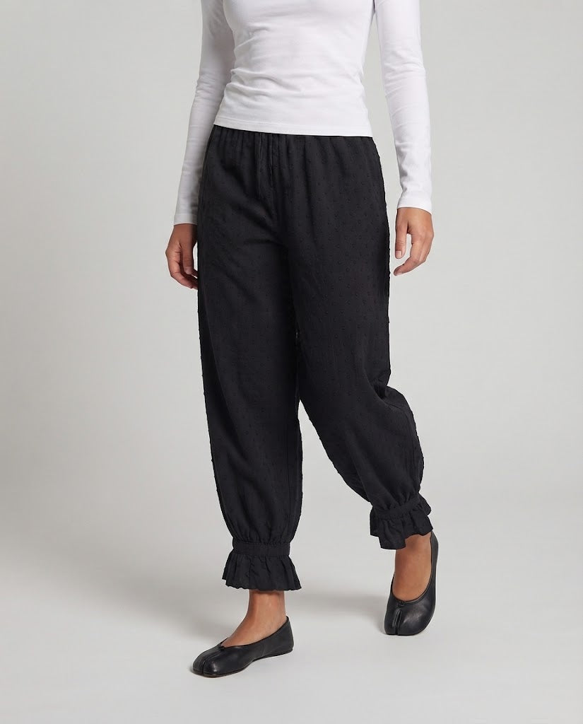 Women's wide linen-look trousers with elastic waistband and flounce cuffs Fashion Glam