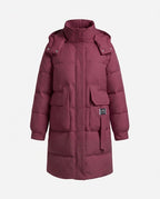 Women's longer padded quilted coat with high stand-up collar, concealed front placket and large patch pockets.