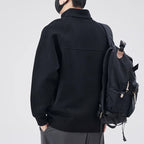 Loose pullover with stand-up collar and zipper