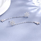 Women’s earrings with sparkling snowflake pendant and chain embellishment Fashion Glam
