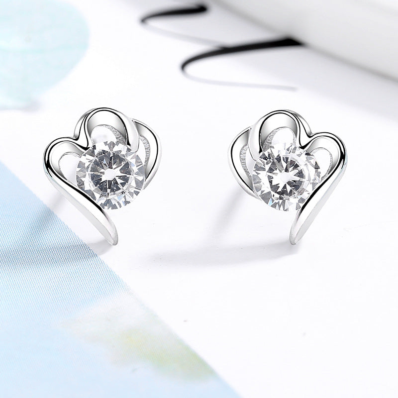 Women’s stud earrings with stylish heart design and sparkling crystals Fashion Glam