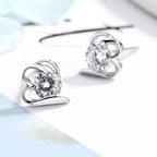Women’s stud earrings with stylish heart design and sparkling crystals Fashion Glam