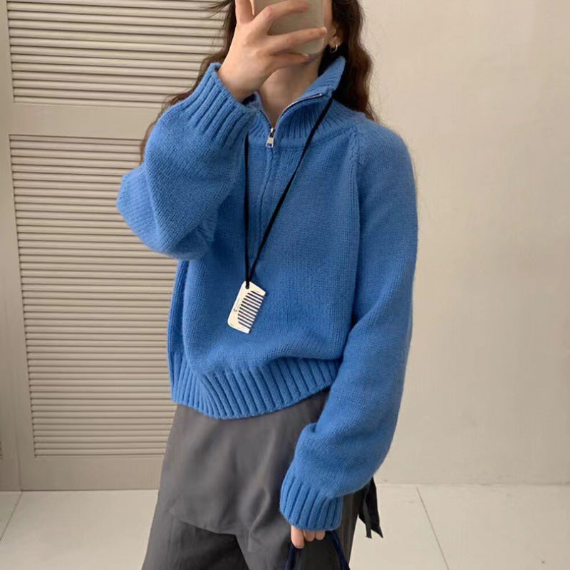Modern knit pullover with stand-up collar and zipper