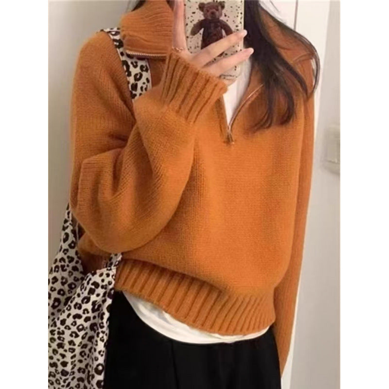 Modern knit pullover with stand-up collar and zipper