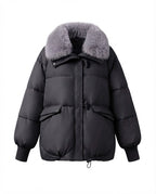 Women's modern oversized puffer with voluminous teddy collar, concealed two-way zipper and adjustable hem