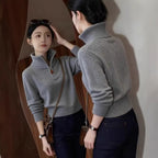 Elegant women's knit sweater with half zipper