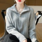 Women's wool sweater with cable pattern and half zipper