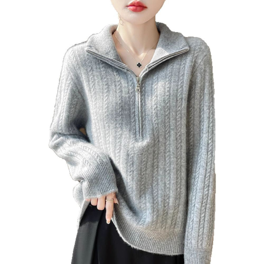 Women's wool sweater with cable pattern and half zipper