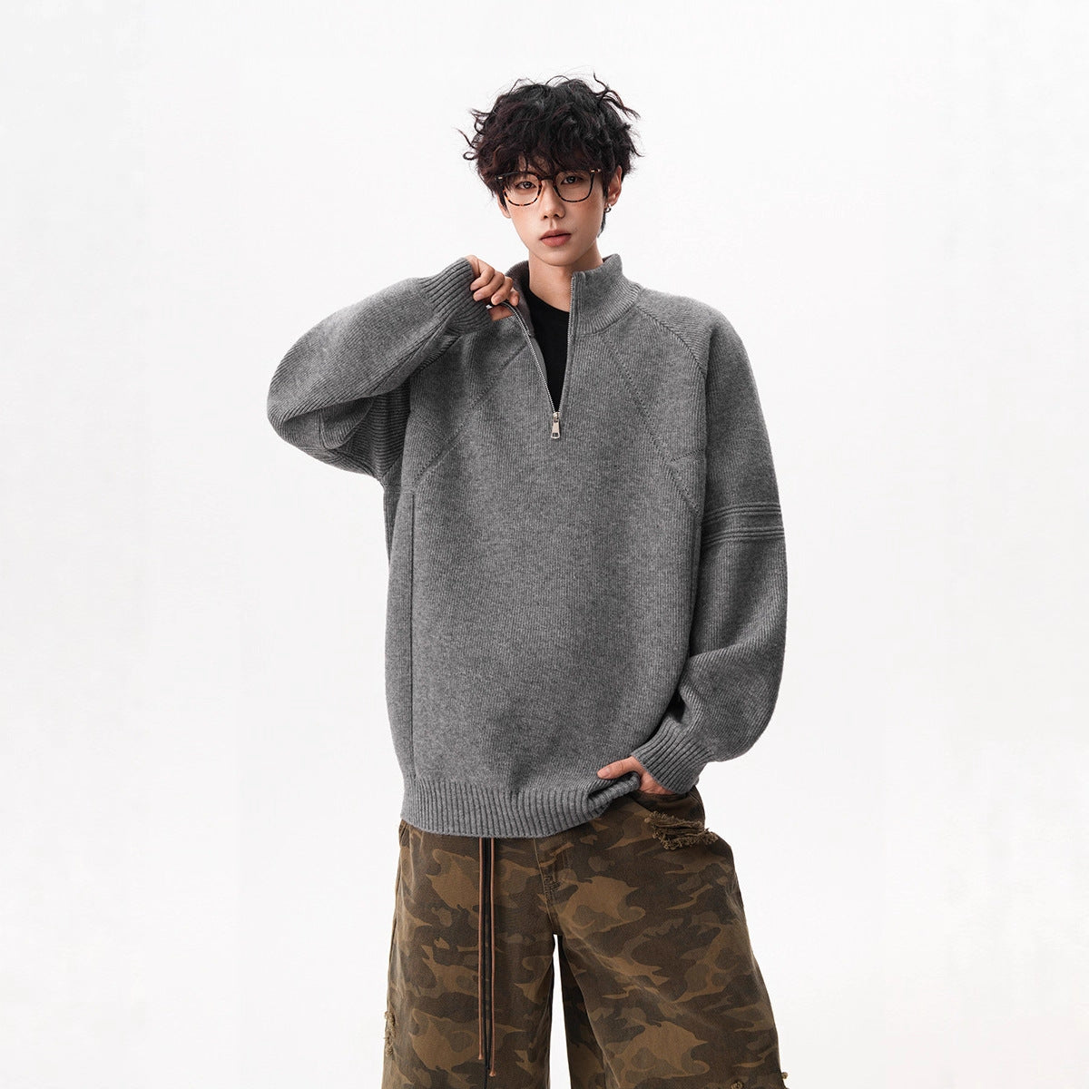 Unisex knitted pullover with stand-up collar and zipper