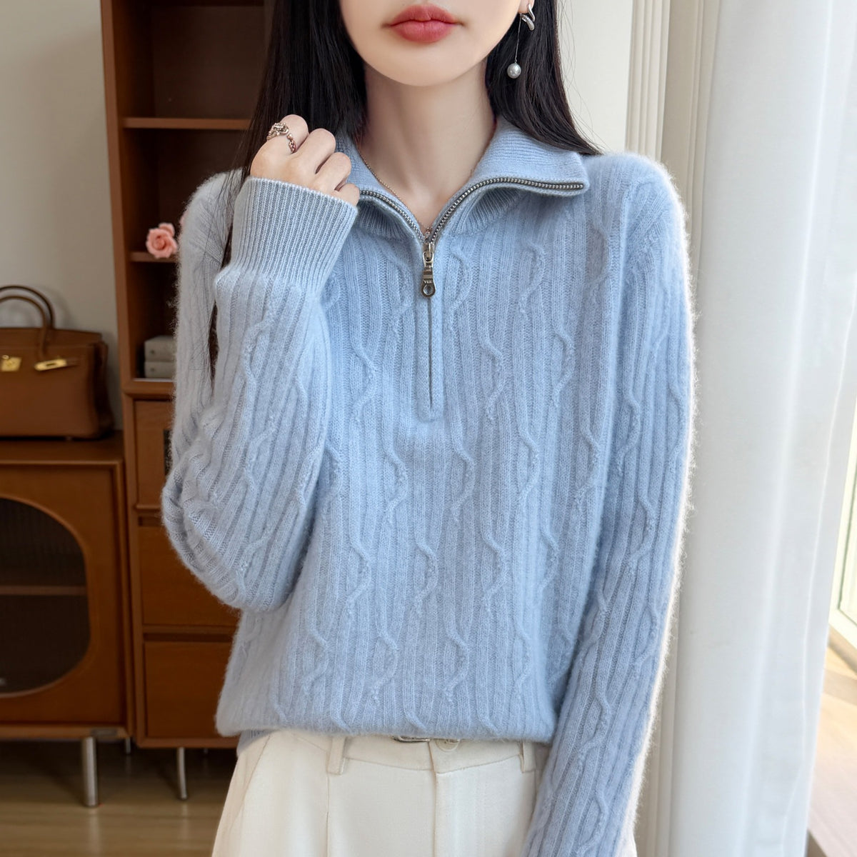 Women's wool pullover with zipper and cable pattern