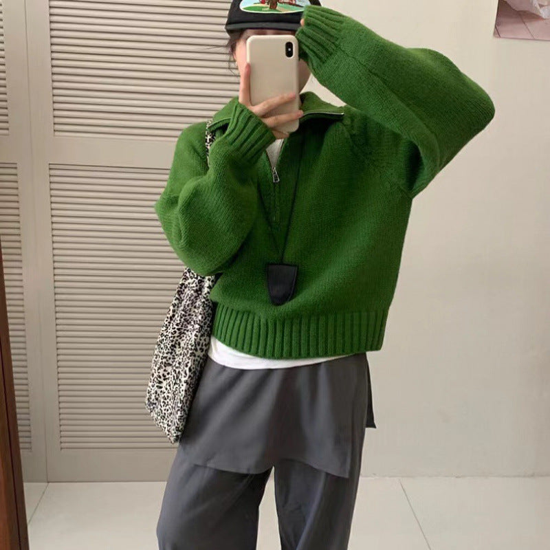 Modern knit pullover with stand-up collar and zipper