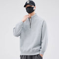 Loose pullover with stand-up collar and zipper