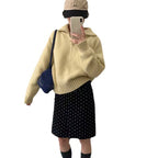 Modern knit pullover with stand-up collar and zipper