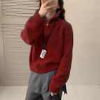 Modern knit pullover with stand-up collar and zipper