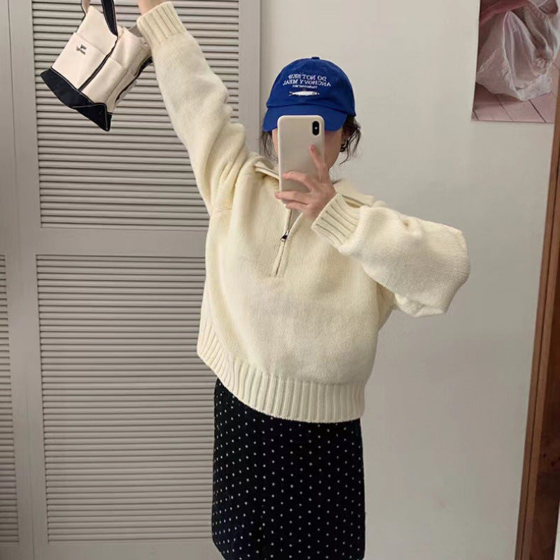 Modern knit pullover with stand-up collar and zipper
