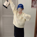 Modern knit pullover with stand-up collar and zipper