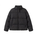 Women's short voluminous padded jacket with high shawl collar, two-way zipper, and concealed side pockets