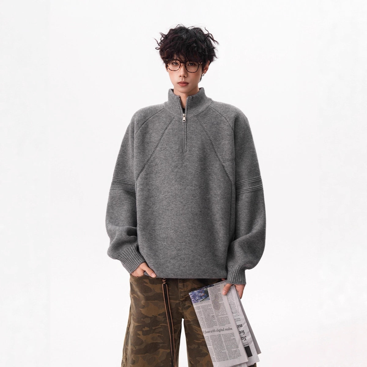 Unisex knitted pullover with stand-up collar and zipper