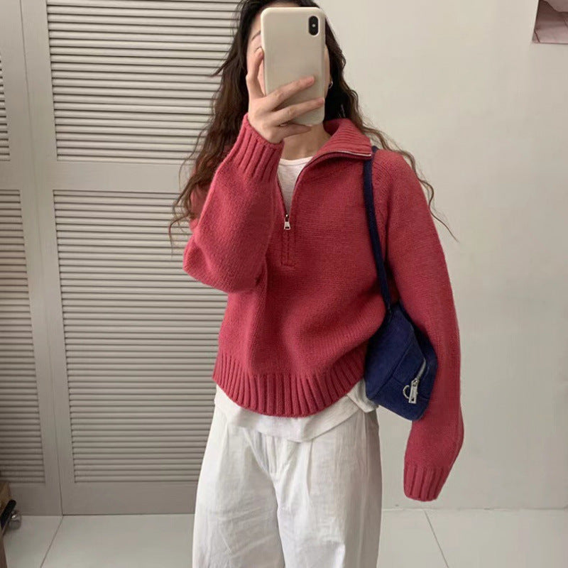 Modern knit pullover with stand-up collar and zipper