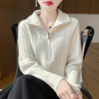Women's wool sweater with cable pattern and half zipper