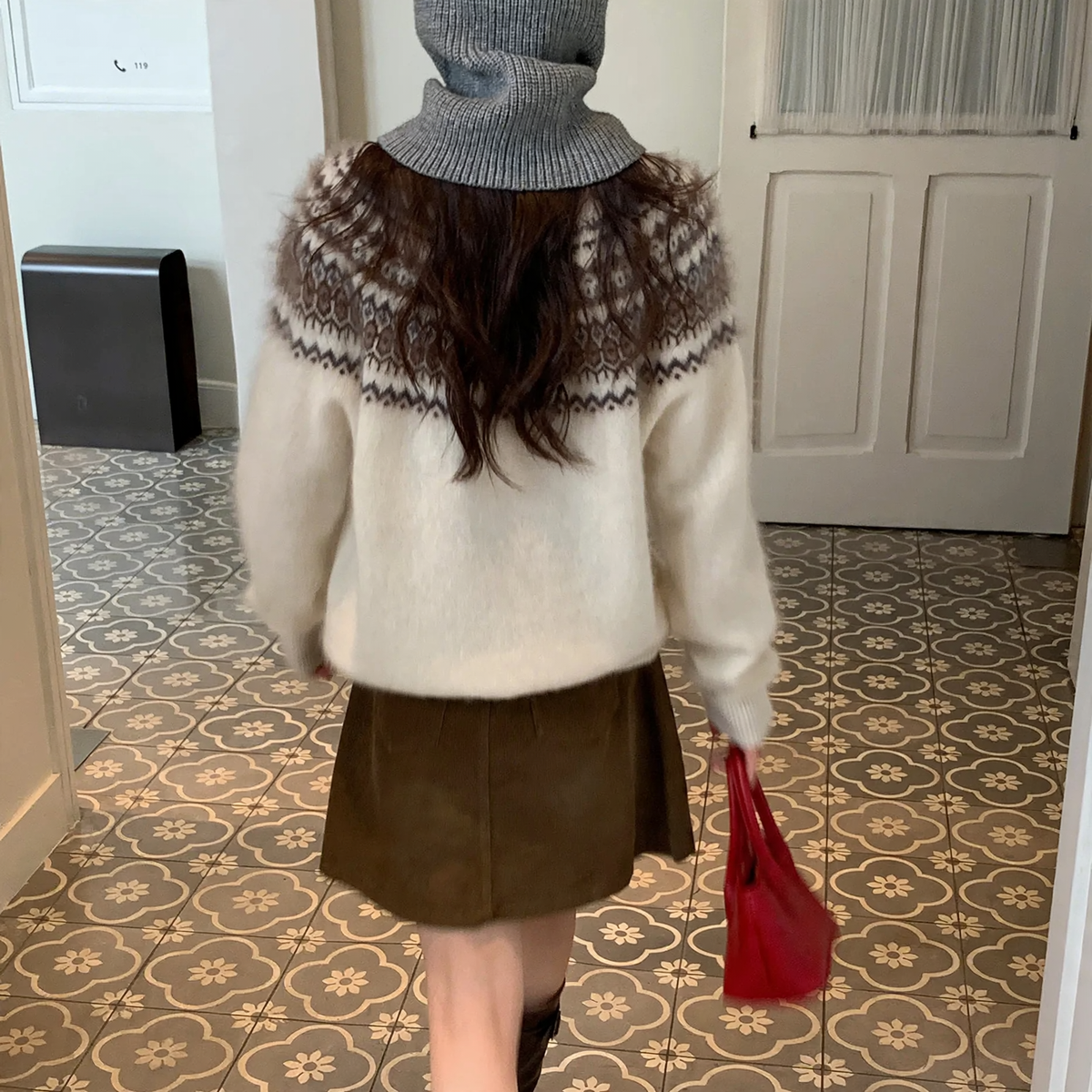 Women's wool sweater with zipper and jacquard pattern