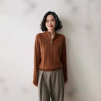 Women's knit pullover with zipper and cable pattern