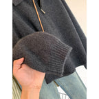 Women's knit sweater with polo collar and zipper