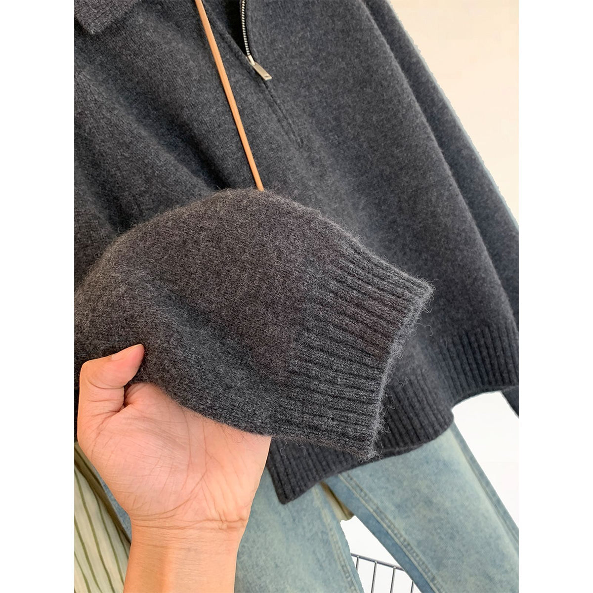 Women's knit sweater with polo collar and zipper