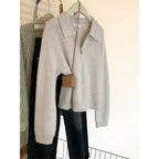 Women's knit sweater with polo collar and zipper
