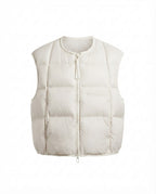 Women's ultra-lightweight padded sleeveless thermal vest with round neckline, square quilting, and adjustable drawstring hem.