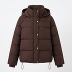Women's padded oversized quilted jacket with high stand-up collar and adjustable drawstring