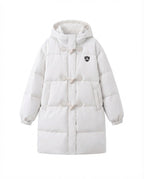 Women's long-cut thermal puffer coat with minimalist button placket, ergonomic stand-up collar, and spacious side pockets