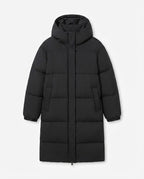 Women's nan ultra-watt-coated longline puffer with ergonomic hood, concealed snap placket, and thermoregulating insulation