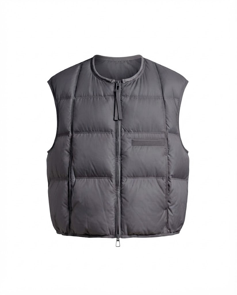 Women's ultra-lightweight padded sleeveless thermal vest with round neckline, square quilting, and adjustable drawstring hem.