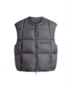 Women's ultra-lightweight padded sleeveless thermal vest with round neckline, square quilting, and adjustable drawstring hem.