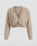 Ladies short cardigan made of fluffy faux fur knit with deep V-neck and decorative button Fashion Glam