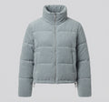 Women's short cord puffer with voluminous shawl collar, concealed snap button placket, and warming thermal lining