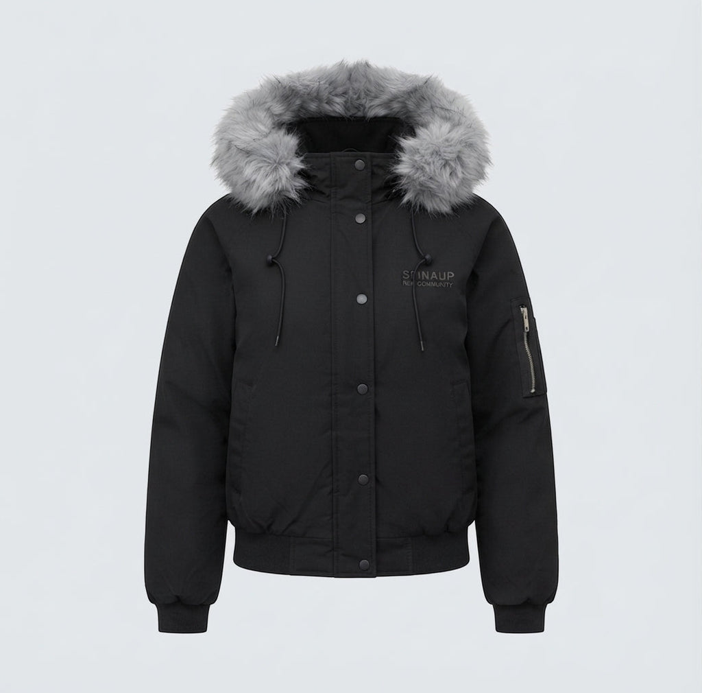 Women's short quilted city bomber with voluminous hood, drawstring, and windproof thermal lining