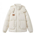 Women's short-cut oversized winter parka with padded cargo pockets and high-closure stand-up collar