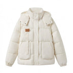 Women's short-cut oversized winter parka with padded cargo pockets and high-closure stand-up collar