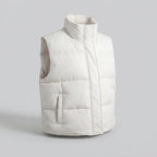 Women's sleeveless thermo quilted vest with high shawl collar and practical side pockets