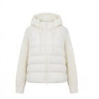 Women's short-cut quilted hybrid jacket with knit sleeves and hood