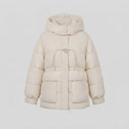 Women's short oversized winter parka with voluminous thermal padding, high stand-up collar, and extra large flap pockets