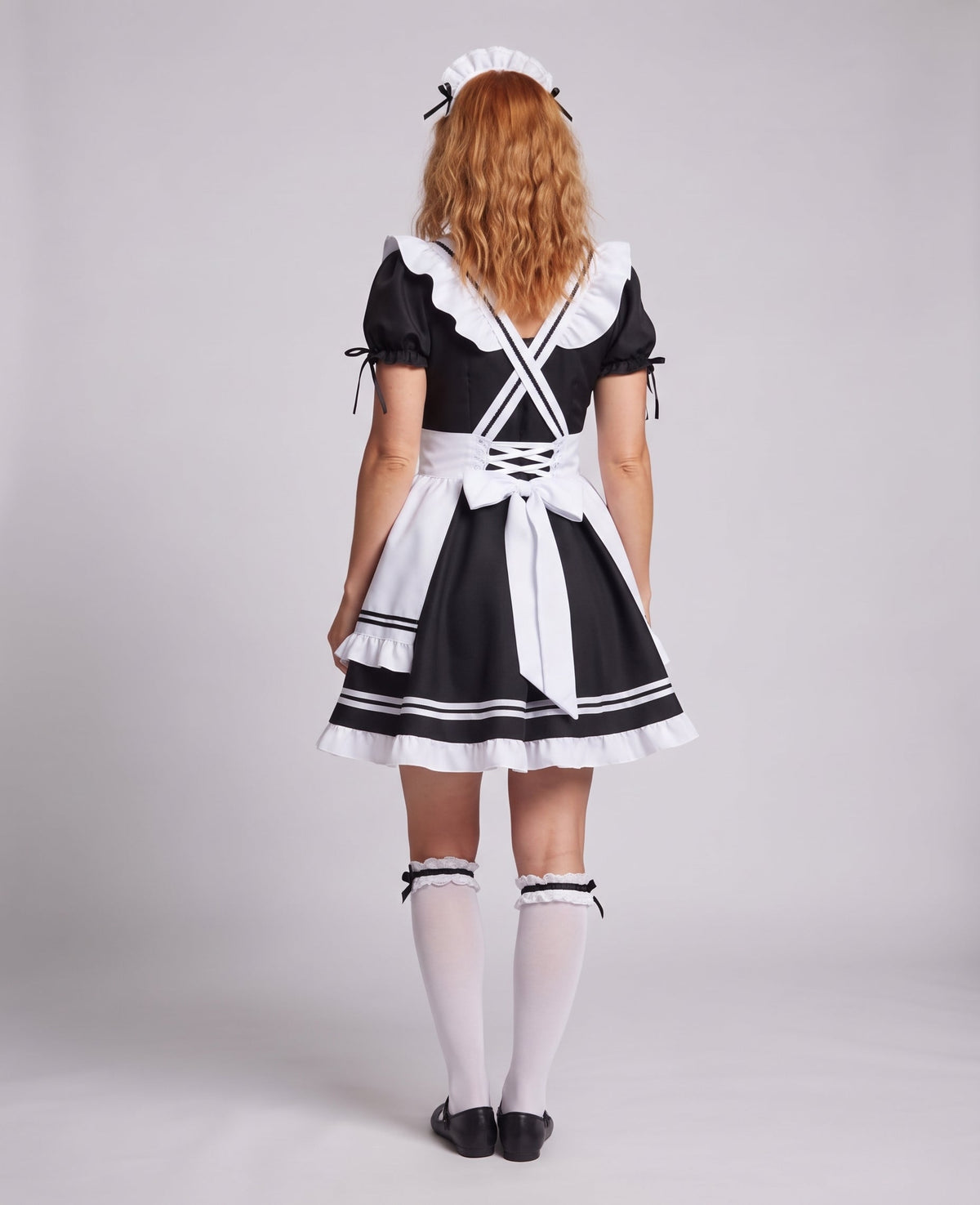 Women's costume as an elegant maid with ruffles and a flared skirt Fashion Glam