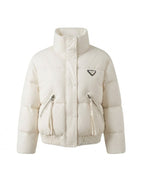 Women's short quilted travel quilted jacket with high closing stand-up collar, tailored ribbed hem and zippered pockets