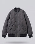 Women's nan dick quilted short jacket in bomber style with diamond stitching and concealed button placket