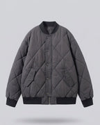 Women's nan dick quilted short jacket in bomber style with diamond stitching and concealed button placket